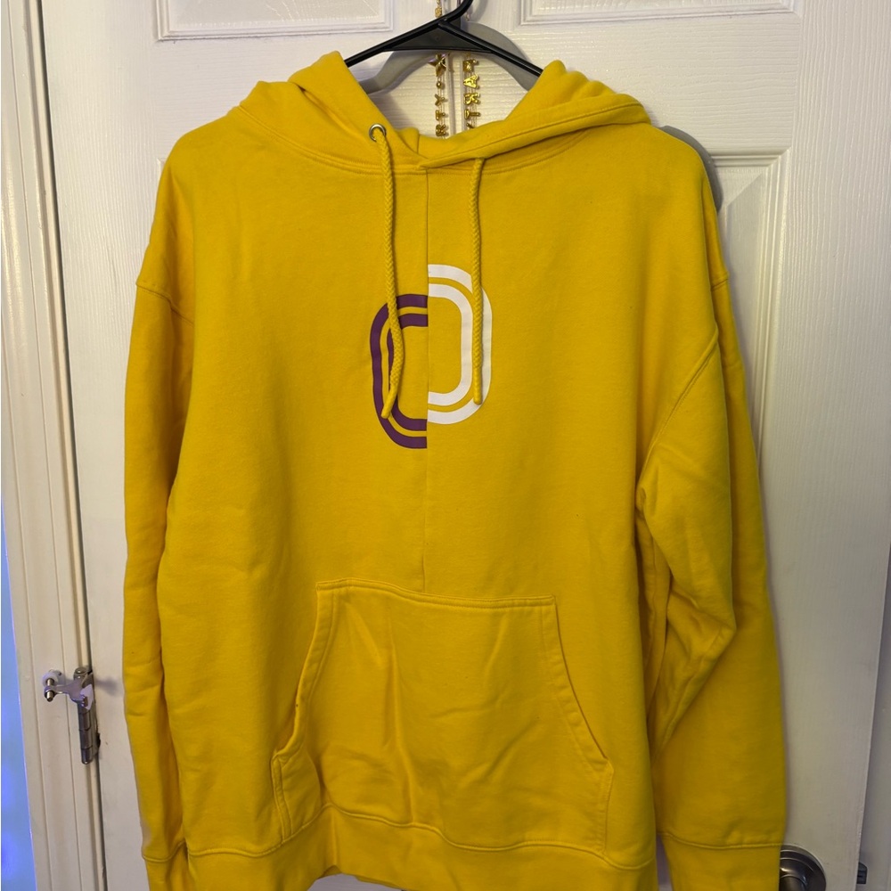 Vibrant Yellow Hoodie with Graphic Design
